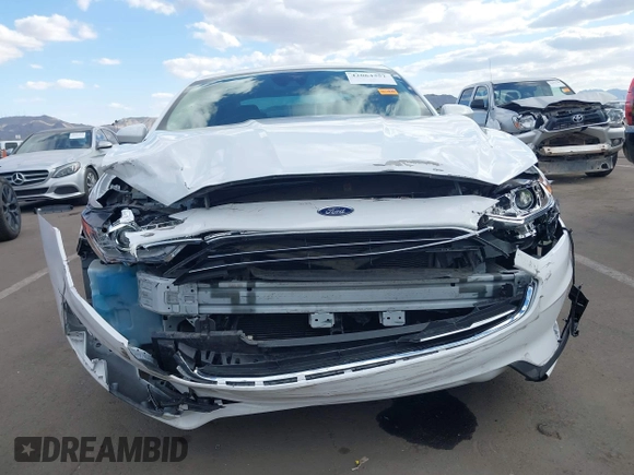 2020 Ford Fusion SE with VIN 3FA6P0HD6LR252987, listed as a IAAI auction lot 42064351 with 63,832 mi miles and . Bid and sale history available at carsss.com. Image 6.