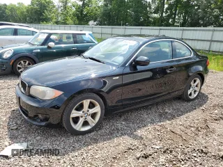 2013 BMW 1 Series 128i with VIN WBAUP9C51DVS95415, listed as a Copart auction lot 65055485 with 88,907 mi miles and Clean title. Bid and sale history available at DreamBid. Image 1.