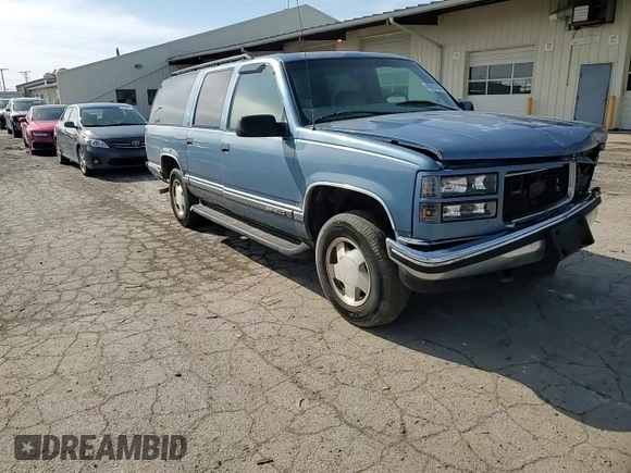 1997 GMC Suburban with VIN 1GKFK16R7VJ707618, listed as a Copart auction lot 49882035 with 317,771 mi miles and Salvage Title. Bid and sale history available at carsss.com. Image 12.