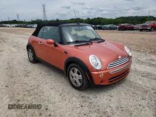 2006 MINI Convertible with VIN WMWRF335X6TF64910, listed as a Copart auction lot 60222215 with 85,761 mi miles and Salvage title. Bid and sale history available at DreamBid. Image 13.