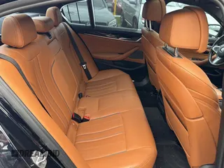 2018 BMW 5 Series M550i xDrive with VIN WBAJB9C57JB035521, listed as a Copart auction lot 54177125 with 63,924 mi miles and Clean Title. Bid and sale history available at carsss.com. Image 6.
