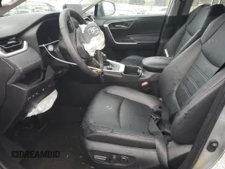 2024 Toyota RAV4 Hybrid XLE Premium with VIN 2T3B6RFV6RW066043, listed as a Copart auction lot 43470115 with 9,454 mi miles and Salvage Title. Bid and sale history available at DreamBid. Image 7.