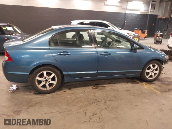 2009 Honda Civic LX z VIN 2HGFA16589H339048, wystawiony jako IAAI lot #42369275 z przebiegiem 131 844 mil mil oraz . Historia ofert i sprzedaży dostępna na DreamBid. Obrazek 14.