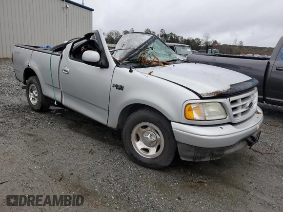 2003 Ford F-150 XL with VIN 1FTRF172X3NB77391, listed as a Copart auction lot 80657174 with Not Provided miles and Salvage Title. Bid and sale history available at DreamBid. Image 4.