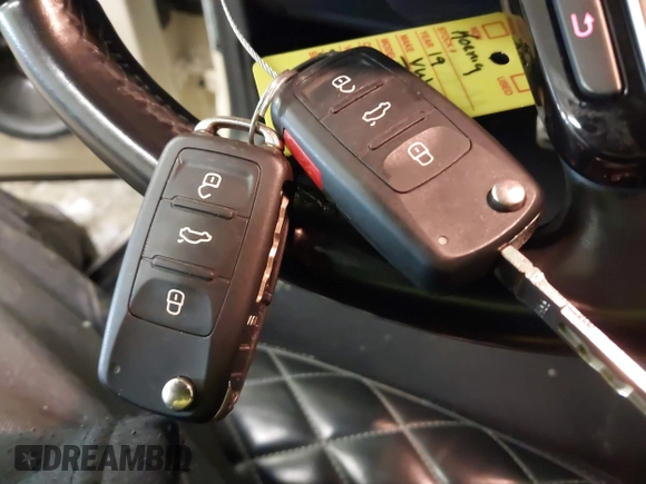 2019 Volkswagen Beetle S with VIN 3VWFD7ATXKM705322, listed as a IAAI auction lot 41409600 with 97,479 mi miles. Bid and sale history available at carsss.com. Image 11.