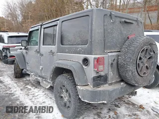 2014 Jeep Wrangler Unlimited Sport with VIN 1C4HJWDG1EL302087, listed as a IAAI auction lot 41420740 with 152,096 mi miles. Bid and sale history available at carsss.com. Image 3.