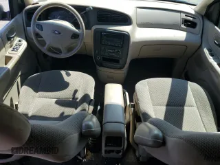 2003 Ford Windstar SE z VIN 2FMDA52473BB10747, wystawiony jako Copart lot #54301075 z przebiegiem 74 513 mil mil oraz Czysty tytuł • Clean title. Historia ofert i sprzedaży dostępna na DreamBid. Obrazek 8.