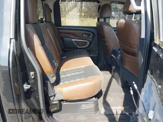2016 Nissan Titan XD Platinum Reserve with VIN 1N6BA1F27GN506410, listed as a IAAI auction lot 41768621 with 159,404 mi miles. Bid and sale history available at carsss.com. Image 8.
