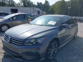 2016 Volkswagen Passat 1.8T S with VIN 1VWAT7A37GC062532, listed as a IAAI auction lot 40267187 with 108,340 mi miles. Bid and sale history available at carsss.com. Image 2.