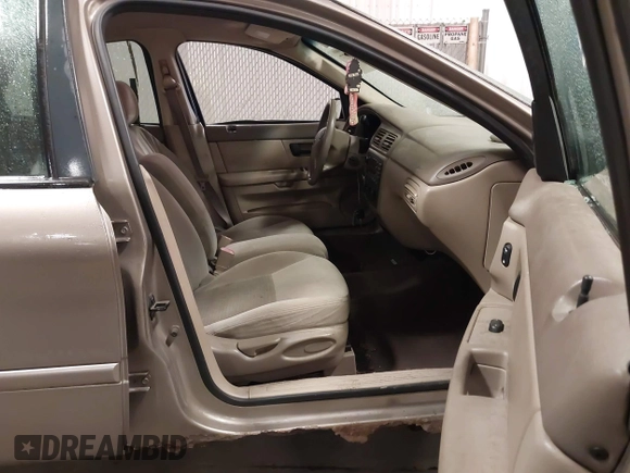 2003 Ford Taurus SES Standard with VIN 1FAFP552X3G184894, listed as a IAAI auction lot 41846677 with 160,824 mi miles. Bid and sale history available at carsss.com. Image 5.
