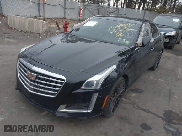 2019 Cadillac CTS Luxury RWD with VIN 1G6AR5SS2K0100788, listed as a IAAI auction lot 41515814 with 70,799 mi miles and . Bid and sale history available at DreamBid. Image 2.