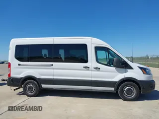 2024 Ford Transit Passenger XL z VIN 1FBAX2C81RKA68648, wystawiony jako IAAI lot #41980956 z przebiegiem 11 942 mil mil oraz . Historia ofert i sprzedaży dostępna na DreamBid. Obrazek 13.