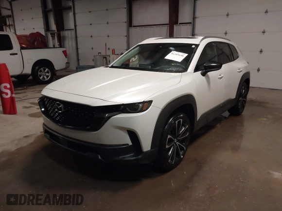 2023 Mazda CX-50 S Premium Plus with VIN 7MMVABEMXPN139186, listed as a IAAI auction lot 41289690 with 26,556 mi miles and . Bid and sale history available at DreamBid. Image 17.