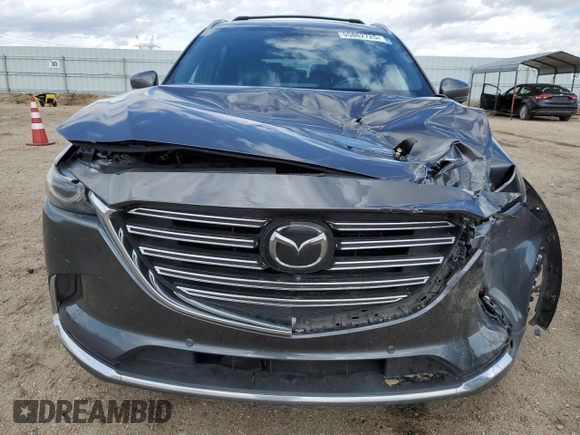 2021 Mazda CX-9 Grand Touring with VIN JM3TCBDY7M0536781, listed as a Copart auction lot 55862725 with 62,131 mi miles and Salvage title. Bid and sale history available at DreamBid. Image 5.