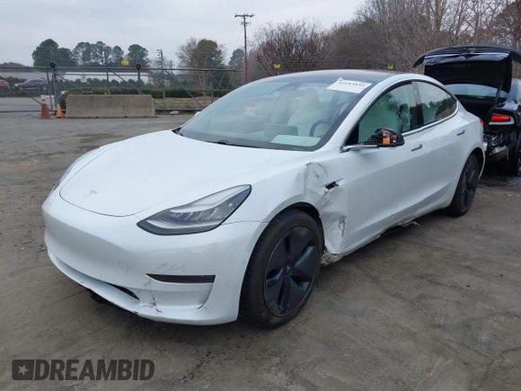 2018 Tesla Model 3 Long Range Battery with VIN 5YJ3E1EB4JF086012, listed as a IAAI auction lot 41683859 with 52,059 mi miles and . Bid and sale history available at DreamBid. Image 19.