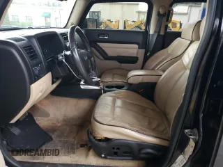 2009 Hummer H3 SUV with VIN 5GTEN13E698131090, listed as a Copart auction lot 73121634 with 199,610 mi miles and Salvage Title. Bid and sale history available at carsss.com. Image 7.