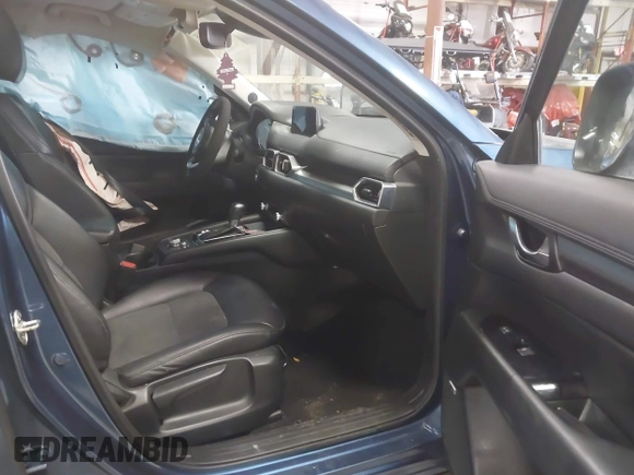 2019 Mazda CX-5 Touring with VIN JM3KFBCM1K0584369, listed as a IAAI auction lot 41657765 with 77,934 mi miles. Bid and sale history available at carsss.com. Image 5.