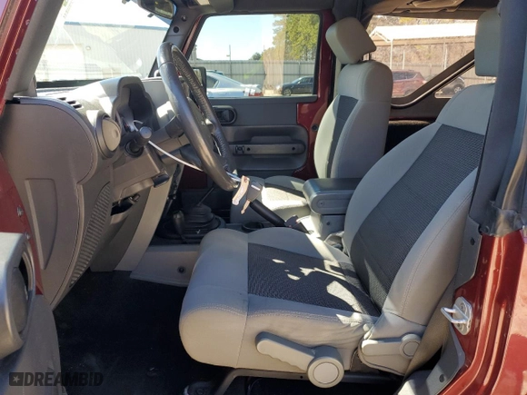 2010 Jeep Wrangler Mountain with VIN 1J4AA2D17AL211867, listed as a Copart auction lot 47586585 with 140,320 mi miles and Salvage Title. Bid and sale history available at carsss.com. Image 7.