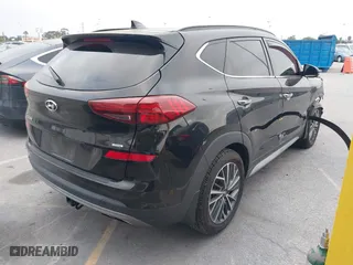 2021 Hyundai Tucson Sport with VIN KM8J3CALXMU294927, listed as a IAAI auction lot 41991926 with 69,882 mi miles. Bid and sale history available at carsss.com. Image 4.