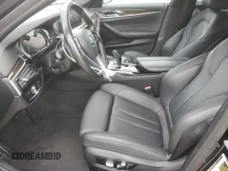 2018 BMW 5 Series 530i with VIN WBAJA5C51JWA38499, listed as a Copart auction lot 49150205 with 59,521 mi miles and Salvage Title. Bid and sale history available at DreamBid. Image 7.