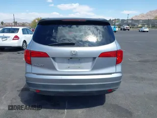 2016 Honda Pilot LX with VIN 5FNYF5H10GB044006, listed as a IAAI auction lot 42075404 with 129,642 mi miles and . Bid and sale history available at DreamBid. Image 16.