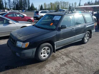 1999 Subaru Forester L with VIN JF1SF6351XH716957, listed as a IAAI auction lot 41969521 with 253,696 mi miles. Bid and sale history available at carsss.com. Image 2.