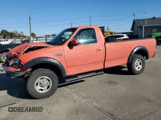 1999 Ford F-150 with VIN 1FTRF18WXXKB91056, listed as a Copart auction lot 79972304 with 108,490 mi miles and Salvage title. Bid and sale history available at DreamBid. Image 1.