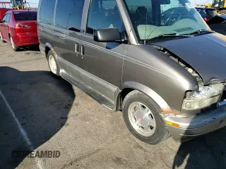 2003 GMC Safari z VIN 1GKDM19X13B516327, wystawiony jako Copart lot #83827794 z przebiegiem 200 280 mil mil oraz Szkoda całkowita • Salvage title. Historia ofert i sprzedaży dostępna na DreamBid. Obrazek 11.