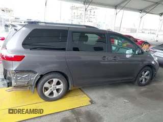 2015 Toyota Sienna LE AAS with VIN 5TDKK3DC8FS585957, listed as a IAAI auction lot 41888825 with 157,364 mi miles and . Bid and sale history available at DreamBid. Image 14.