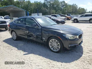 2014 BMW 3 Series 328i Gran Turismo xDrive with VIN WBA3X5C56ED557120, listed as a Copart auction lot 55584315 with 154,405 mi miles and Salvage title. Bid and sale history available at DreamBid. Image 4.
