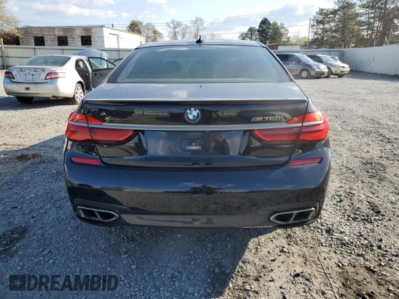 2019 BMW 7 Series M760i xDrive with VIN WBA7H6C55KG615037, listed as a Copart auction lot 80218404 with 43,405 mi miles and Salvage Title. Bid and sale history available at carsss.com. Image 6.