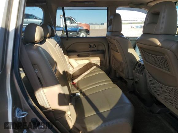 2005 Honda Pilot EX-L z VIN 5FNYF18525B064752, wystawiony jako Copart lot #56022115 z przebiegiem 221 161 mil mil oraz Szkoda całkowita • Salvage title. Historia ofert i sprzedaży dostępna na DreamBid. Obrazek 11.