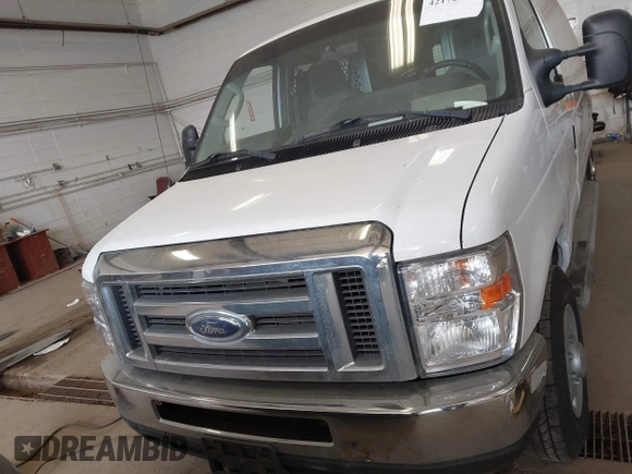 2013 Ford Econoline Cargo Commercial with VIN 1FTNE2EW0DDA16097, listed as a IAAI auction lot 42172617 with 369,619 mi miles and . Bid and sale history available at DreamBid. Image 12.