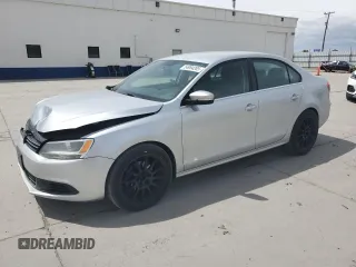 2013 Volkswagen Jetta SE with VIN 3VWBP7AJ4DM387575, listed as a Copart auction lot 54984285 with 106,672 mi miles and Salvage title. Bid and sale history available at DreamBid. Image 1.