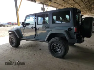 2014 Jeep Wrangler Unlimited Rubicon with VIN 1C4BJWFG4EL141706, listed as a Copart auction lot 51305235 with 106,919 mi miles and Salvage Title. Bid and sale history available at carsss.com. Image 2.