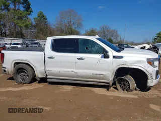 2020 GMC Sierra 1500 Denali z VIN 1GTU9FEL7LZ152659, wystawiony jako IAAI lot #41662492 z przebiegiem 101 222 mil mil oraz . Historia ofert i sprzedaży dostępna na DreamBid. Obrazek 6.