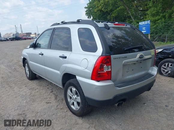 2009 Kia Sportage LX with VIN KNDJF724997633726, listed as a IAAI auction lot 39952246 with 201,090 mi miles and . Bid and sale history available at DreamBid. Image 3.
