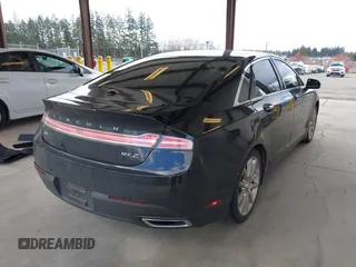 2016 Lincoln MKZ Hybrid with VIN 3LN6L2LUXGR628147, listed as a IAAI auction lot 41815863 with 97,961 mi miles. Bid and sale history available at carsss.com. Image 4.