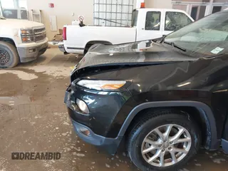 2015 Jeep Cherokee Latitude with VIN 1C4PJLCB9FW536767, listed as a IAAI auction lot 41380122 with 192,535 mi miles. Bid and sale history available at carsss.com. Image 19.