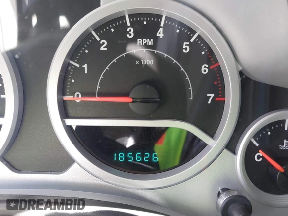 2010 Jeep Wrangler Unlimited Sport with VIN 1J4BA3H17AL211887, listed as a IAAI auction lot 41778324 with 185,626 mi miles. Bid and sale history available at carsss.com. Image 7.