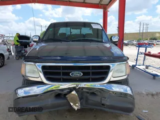 2002 Ford F-150 XL with VIN 2FTRX07L82CA55701, listed as a IAAI auction lot 41966222 with 103,226 mi miles and . Bid and sale history available at DreamBid. Image 12.