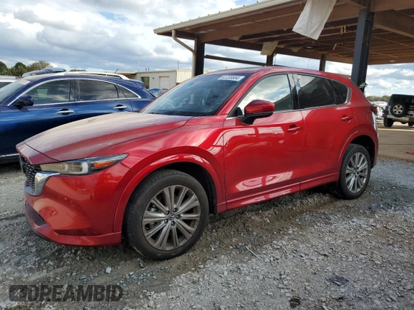 2023 Mazda CX-5 Signature with VIN JM3KFBXY4P0100652, listed as a Copart auction lot 82235664 with 29,344 mi miles and Salvage Title. Bid and sale history available at carsss.com. Image 1.