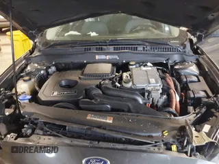 2015 Ford Fusion S Hybrid with VIN 3FA6P0UU8FR178675, listed as a IAAI auction lot 42104712 with 129,998 mi miles. Bid and sale history available at carsss.com. Image 10.
