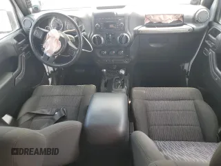 2012 Jeep Wrangler Unlimited Sport with VIN 1C4BJWDG6CL240673, listed as a Copart auction lot 60669625 with Not provided miles and Salvage title. Bid and sale history available at DreamBid. Image 8.