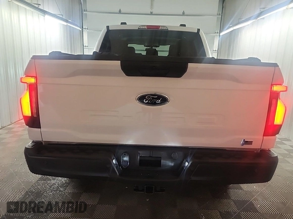 2023 Ford F-150 Lightning Pro z VIN 1FTVW1EL0PWG02840, wystawiony jako IAAI lot #42379448 z przebiegiem 52 710 mil mil oraz . Historia ofert i sprzedaży dostępna na DreamBid. Obrazek 49.