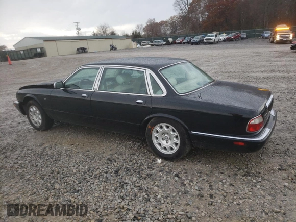 2003 Jaguar XJ Vanden Plas with VIN SAJDA24C33LF52131, listed as a Copart auction lot 84263554 with Not provided miles and Clean title. Bid and sale history available at DreamBid. Image 2.