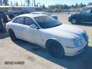 2004 Jaguar S-Type with VIN SAJEA01U74HM96220, listed as a IAAI auction lot 42180627 with 160,015 mi miles and . Bid and sale history available at DreamBid. Image 1.