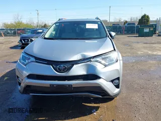 2018 Toyota RAV4 XLE with VIN JTMWFREV3JD120189, listed as a IAAI auction lot 41976999 with 62,182 mi miles and . Bid and sale history available at carsss.com. Image 13.