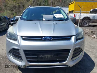 2016 Ford Escape Titanium with VIN 1FMCU9JXXGUA51537, listed as a IAAI auction lot 42118922 with 109,439 mi miles. Bid and sale history available at carsss.com. Image 6.