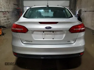 2017 Ford Focus SE with VIN 1FADP3F29HL223970, listed as a Copart auction lot 66022345 with 104,601 mi miles and Clean title. Bid and sale history available at DreamBid. Image 6.
